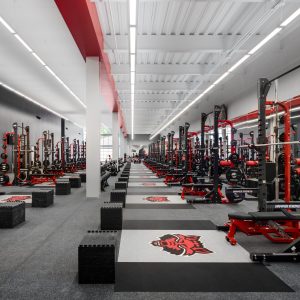 Arkansas State University Footbal Opps Weight Room filled with equipment