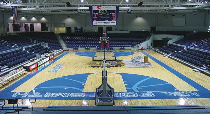 Fort Smith Basketball court with arena seating and bleachers.